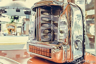 Old jukebox music player in Pub restaurant, Vintage style Stock Photo