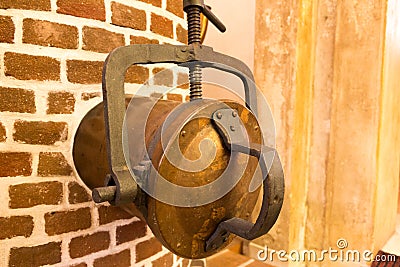 Old bronze kettle displayed in a museum distillery Editorial Stock Photo