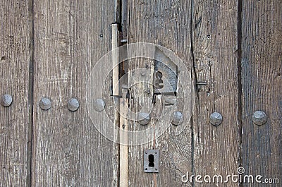 Old keyhole on wooden door Stock Photo