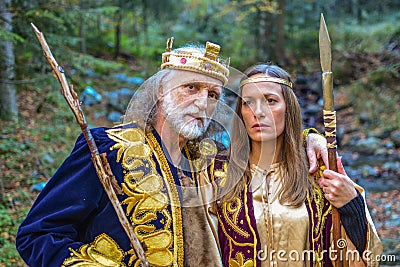 Old king and queen in the forest Stock Photo