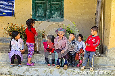 An old lady looking for a group of children, Northern Vietnam Editorial Stock Photo