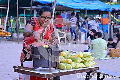 Old Lady Selling Corns at Juhu, Mumbai, India Editorial Stock Photo