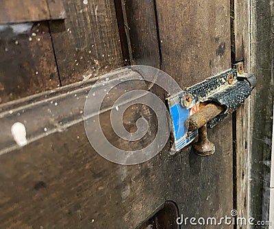 old latch key, old fragile latch key, broken latch lock, rusty iron key Stock Photo