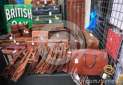 Old leather briefcases on street market stall Stock Photo