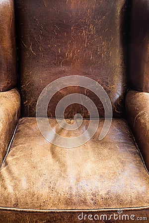Old leather chair close-up, brown texture, retro design Stock Photo