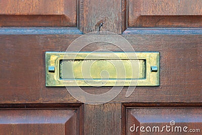 Old letterbox in the door, traditional way of delivering letters to the house, old mailbox Stock Photo