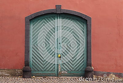 Old light green wooden door. Stock Photo