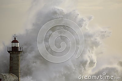 Old lighthouse during storm Stock Photo