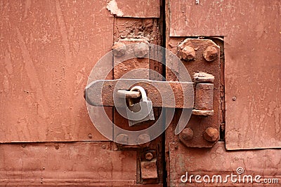 Old lock, latch and rusty gate Stock Photo