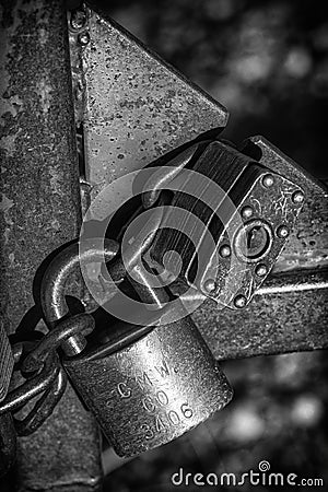 Old Locks on a Rusty Gate Stock Photo