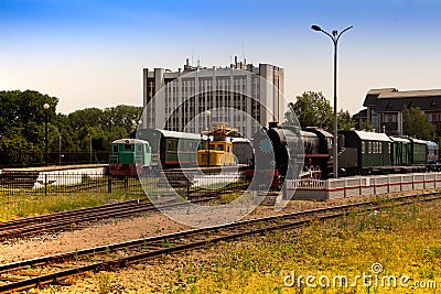 Old locomotive on the siding tracks of the railway station Stock Photo