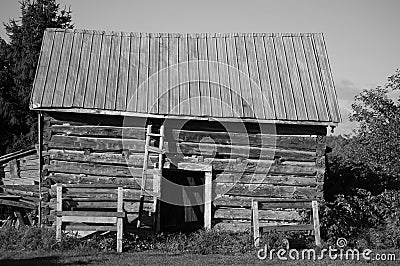 Old log barn outbuilding Stock Photo