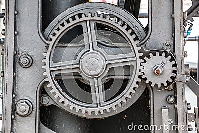 Old machine with toothed gears made of steel Stock Photo