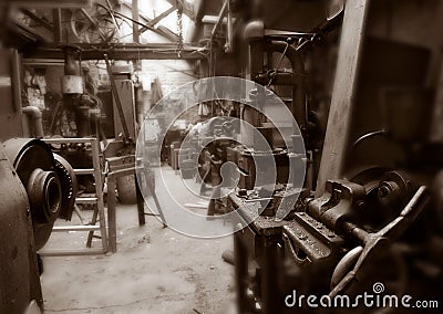 OLD MACHINERY IN DERELICT TEXTILE MILL Editorial Stock Photo