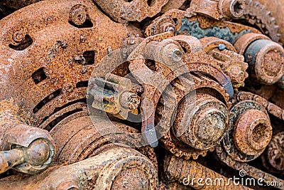 Old machinery parts. corroded metal gearwheels closeup. Stock Photo