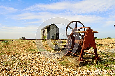 Old machinery and shack Stock Photo