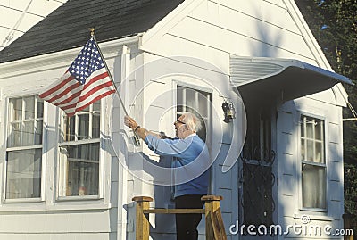 Old Man with American Flag Editorial Stock Photo