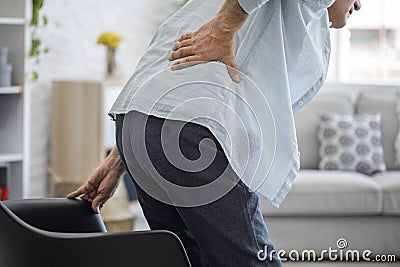 Old man with back pain Stock Photo