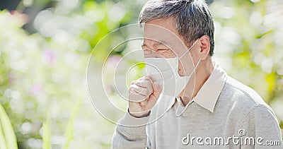 Old man cough outdoor Stock Photo