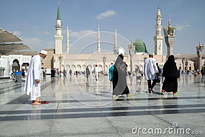 Old man in the courtyard of the mosque of the Prophet, Medina, S Editorial Stock Photo