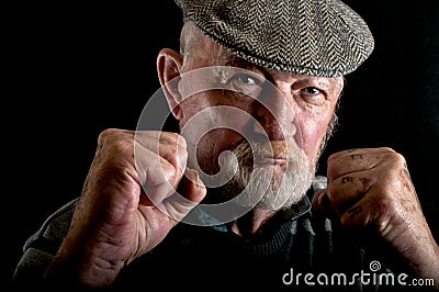 Old man fighting Stock Photo