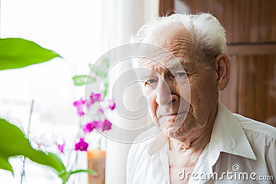 Old man at home Stock Photo