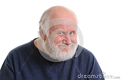 Old man with insidious tricky fake smile, isolated on withe Stock Photo