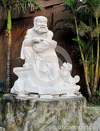 Old man laughing marble statue Stock Photo