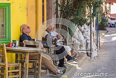 The old man resting on a chair Editorial Stock Photo