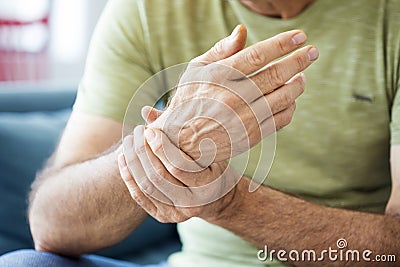 Old man suffering from pain and rheumatism Stock Photo