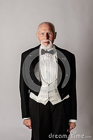 Old man in a tailcoat Stock Photo
