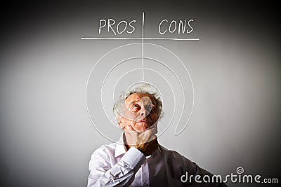 Old man is full of doubts and hesitation. Pros and cons concept. Stock Photo
