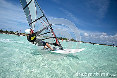 Old man windsurfing on Bonaire. Stock Photo