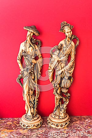 Old, man and woman, chinese statuettes Stock Photo