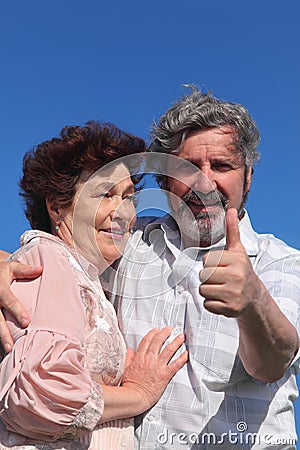 Old man and woman embracing Stock Photo