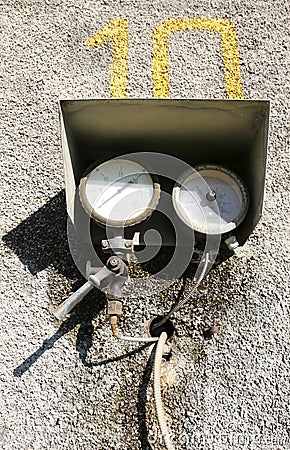 Old manometers of a dismantled industrial plant Stock Photo