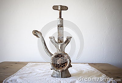 Old manual mincer used during traditional home slaughtering Stock Photo