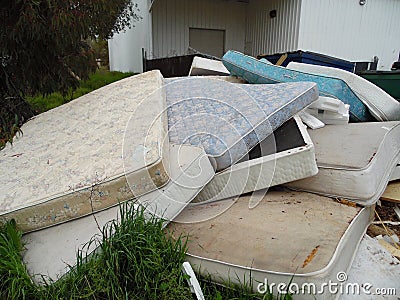 Old Mattresses Dumped Stock Photo