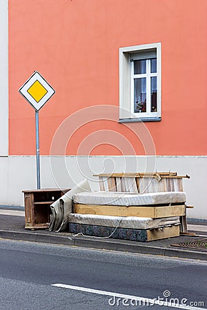 Old mattresses, furniture and household items Stock Photo
