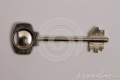 Key made of steel. Case key. Stock Photo