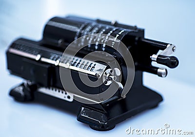 Old mechanical manual counting machine for mathematical calculations Stock Photo