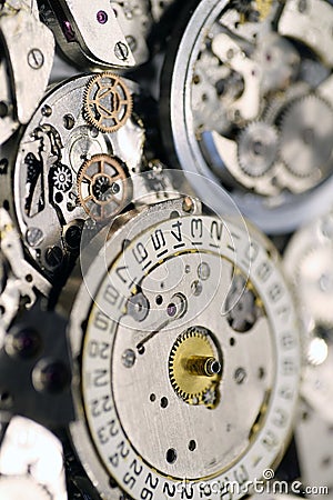 Old mechanical watches with gears and cogs. Watch or clock mechanisms Stock Photo