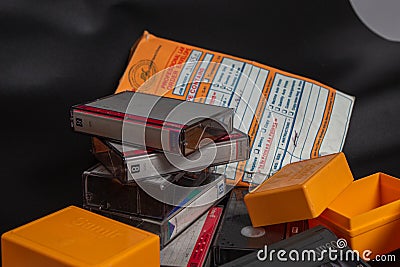 Old Media Stuffs, Old Video Cassette, Old Film reel,Negative Photo reel, Photo Cartridges for Photo projector, Vintage shooting Editorial Stock Photo