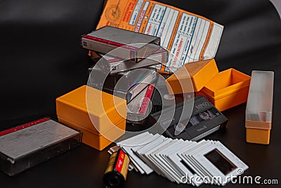 Old Media Stuffs, Old Video Cassette, Old Film reel,Negative Photo reel, Photo Cartridges for Photo projector, Vintage shooting Editorial Stock Photo