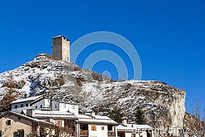 The old medieval castle Steinsberg over the village Ardez Stock Photo