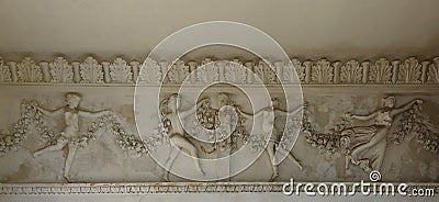 Old medieval elements of architectural decorations of buildings, moldings and patterns with relief shapes Stock Photo