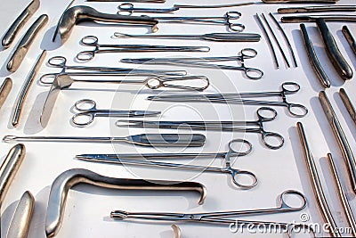 Old metal obstetric, gynecological and urological instruments Stock Photo