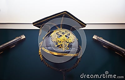 Old military helmet with double-headed eagle on the background o Stock Photo