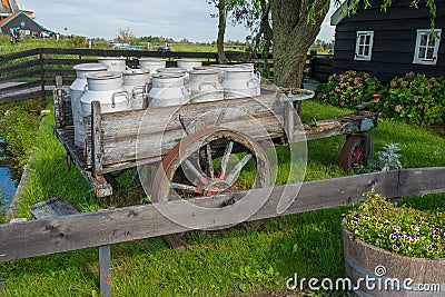 Old milk canisters in Zaandam, Netherlands Stock Photo