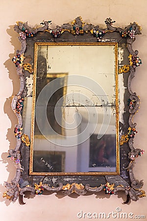 Old mirror in Ducal Palace Museum in Mantua Editorial Stock Photo